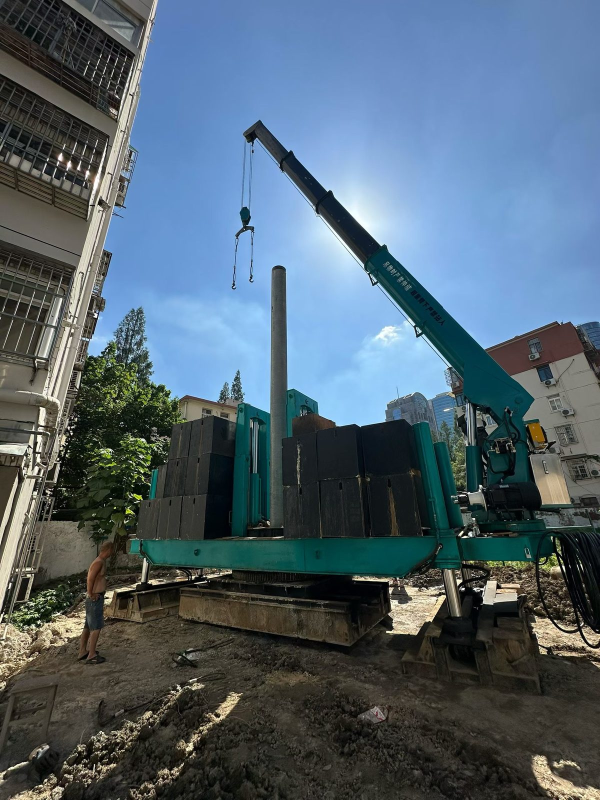 Pile handling with built-in crane